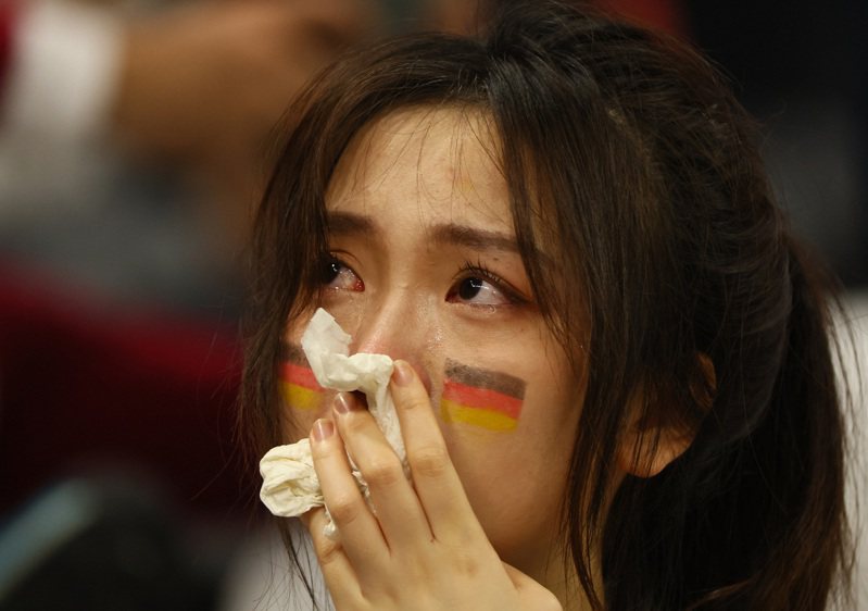 德國連兩屆止步小組賽，讓場邊球迷傷透了心。 路透社