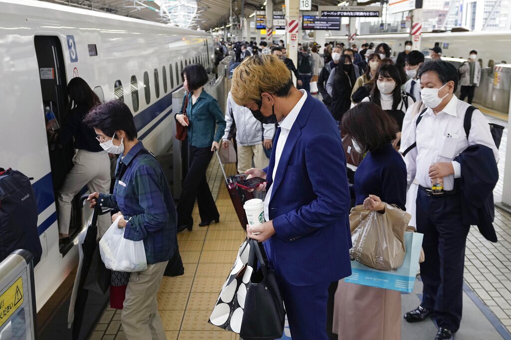 乘客也是讓日本鐵道能夠準時的重要因素。 圖／美聯社