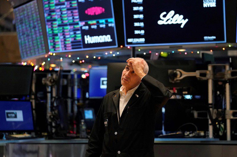 華爾街股市30日封關收黑，全年跌幅創2008年以來的最糟紀錄。法新社