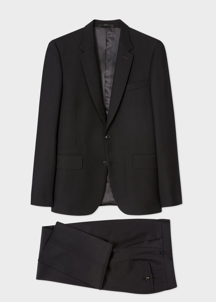 Paul Smith黑色經典素面羊毛西裝外套，38,500元；西裝長褲，16,8...