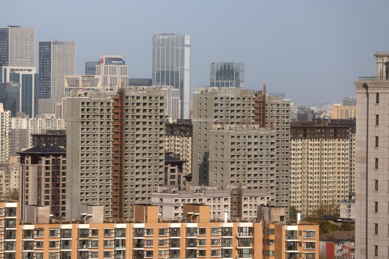 大陸財經專家認為，隨著大陸經濟全面復甦，房地產在2023年的經濟增長中更毫無疑問將扮演「男主角」。圖為北京市豐台區一處在建大樓。中新社