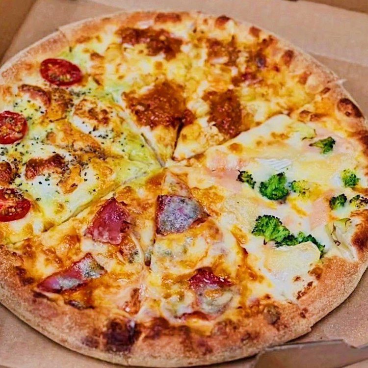 世界10大起司四喜披薩。圖／達美樂披薩臉書