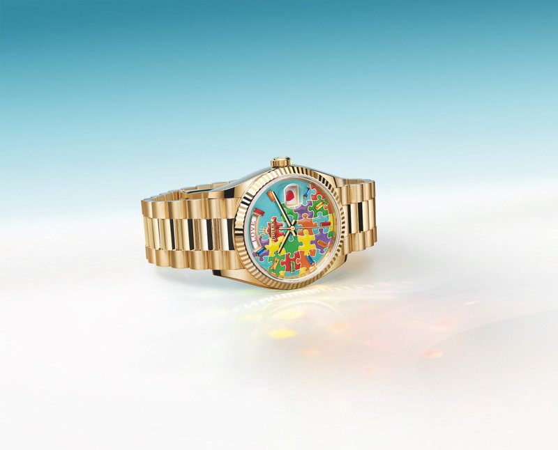 Day-Date 36腕表，18K黃金、鑲嵌10顆方形藍寶石、綠松石藍色、琺瑯、拼圖圖案，182萬9,000元。圖／勞力士提供