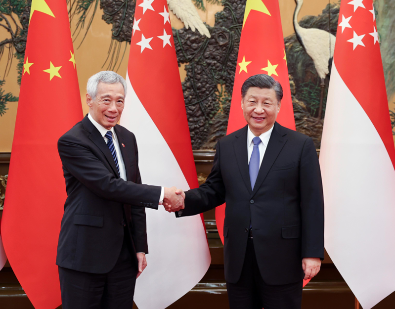 據新華社報導，新加坡總理李顯龍3月31日與大陸國家主席習近平會面時稱，「台灣問題是中國的內政」。（新華社）