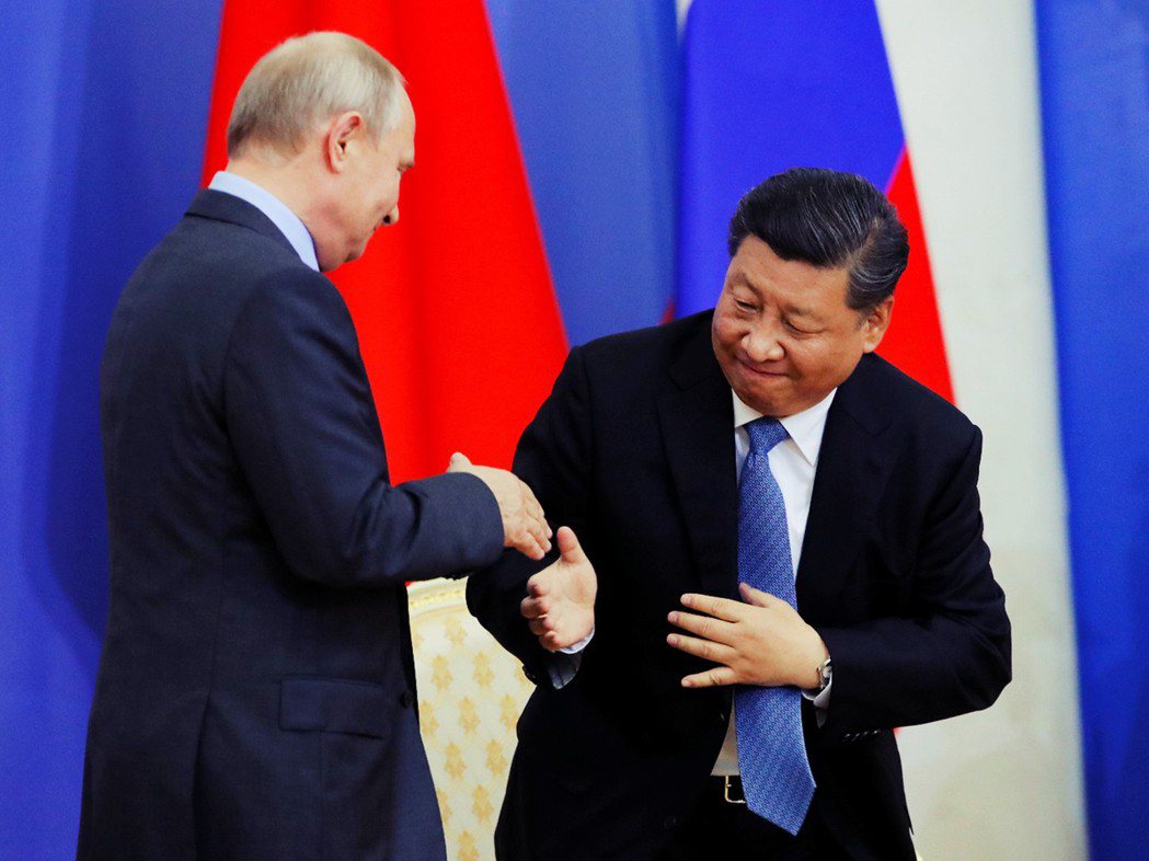2019年會面的中國國家主席習近平與俄羅斯總統普丁。由於在中俄關係上，中國出於意...