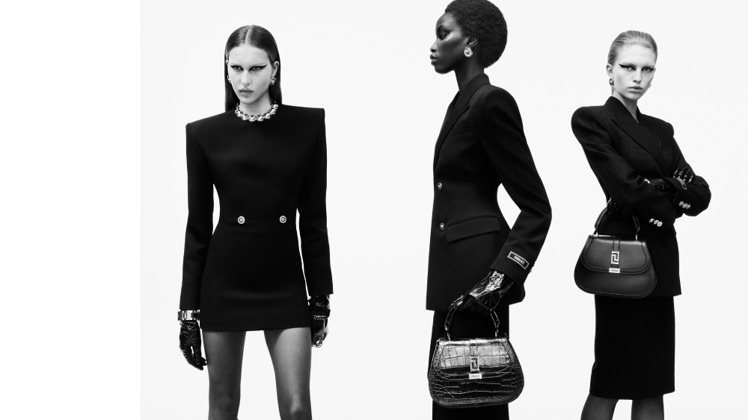 Versace 2023秋冬形象廣告以鮮明黑白對比彰顯服裝的剪裁線條。圖／Versace提供