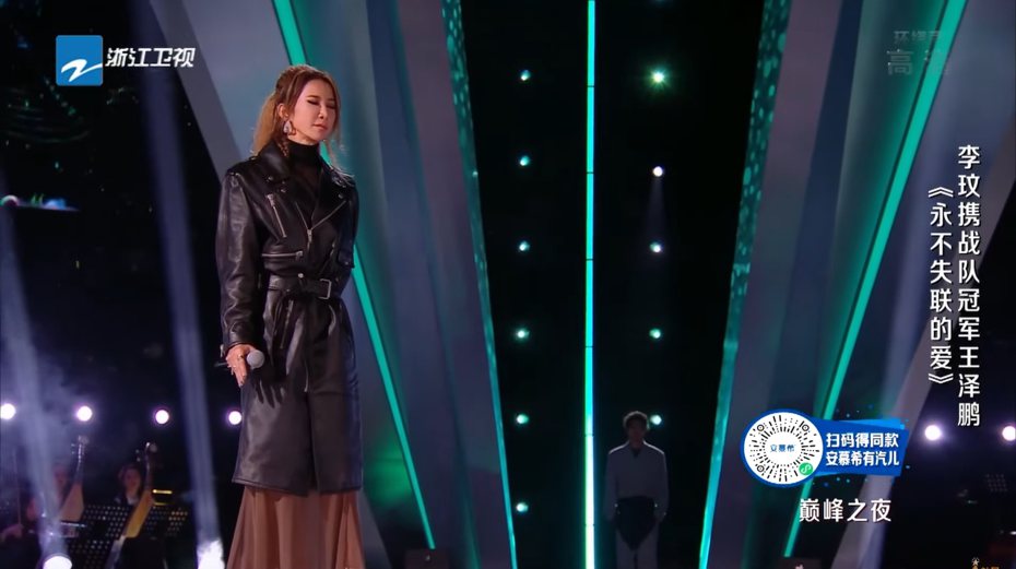 李玟在「中國好聲音」總決賽表演時只能一人獨自站在舞台。 圖／擷自YouTube