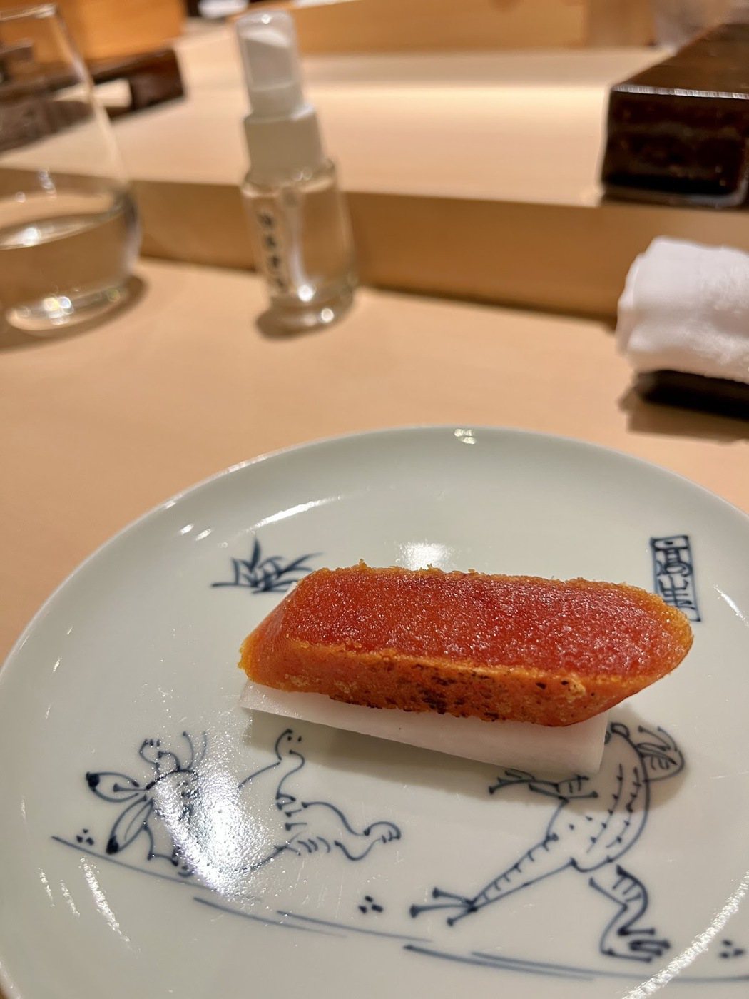 AKIRA的精選菜色／明壽司-溏心烏魚子。圖／AKIRA 提供