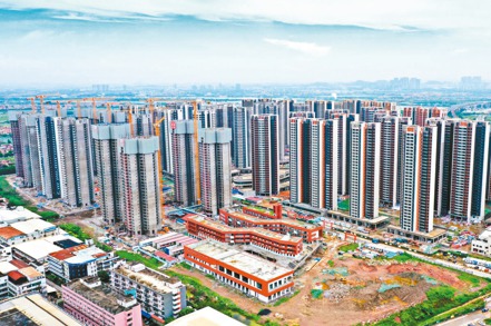 廣州成為大陸第一個響應「認房不認貸」政策的一線城市。 中新社