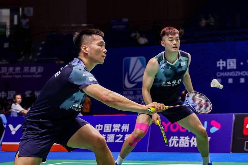 李洋(左)與王齊麟。 Badminton Photo