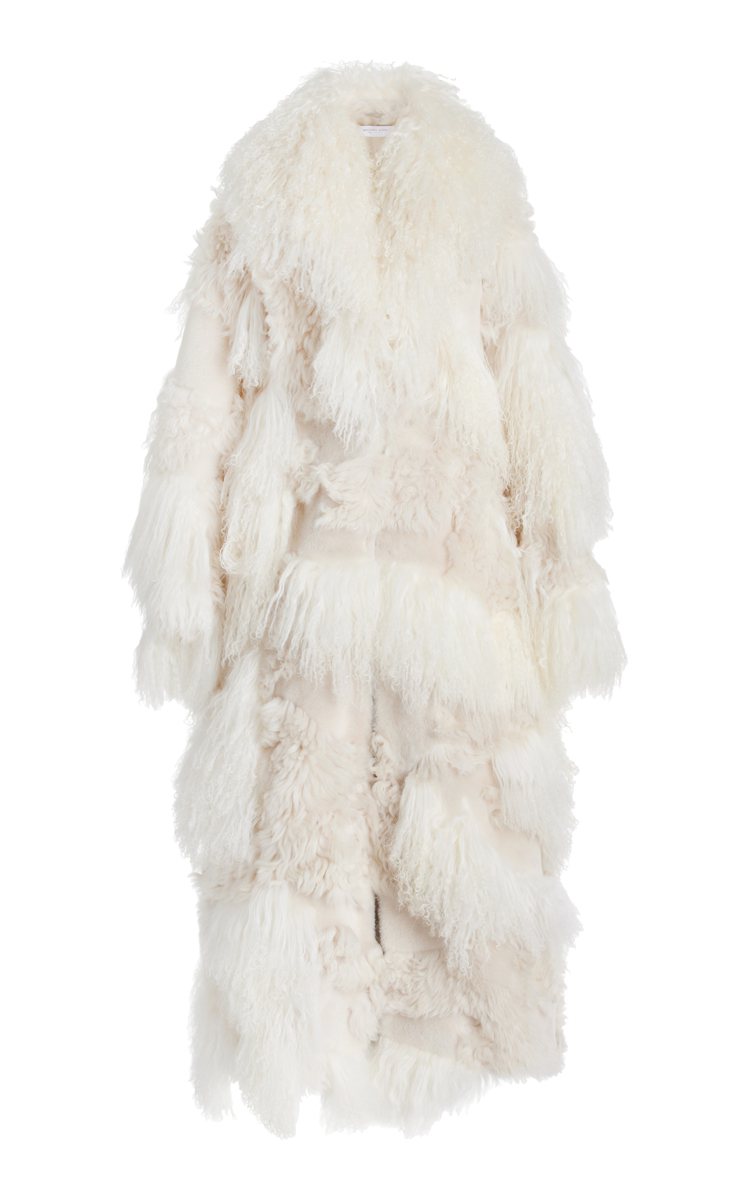 Michael Kors Collection系列象牙白羊毛大衣，約22萬3,700元。圖／MICHAEL KORS提供