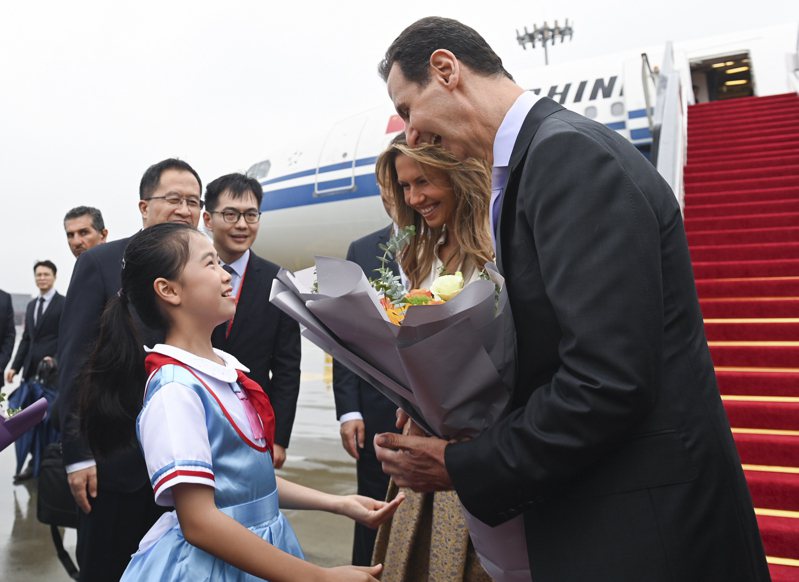 時隔十九年，敘利亞總統阿塞德（右）再訪中國大陸，將出席杭州亞運開幕式，並與大陸國家主席習近平舉行會談。（新華社）