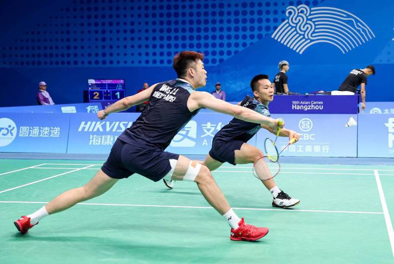 李洋(右)、王齊麟。 badminton photo