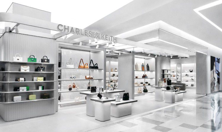 CHARLES & KEITH板橋大遠百專賣店，全新店面以曲線牆面與乾淨簡約的中性色調，營造出舒適友善的購物氛圍。圖／CHARLES & KEITH提供
