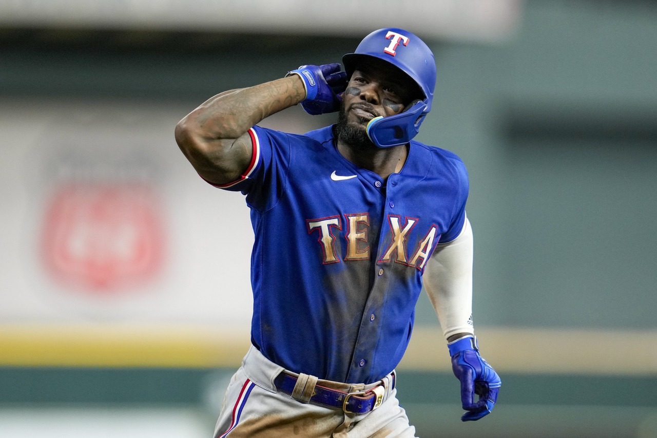 Rangers Defeat Astros in Game 7 to Advance to World Series: Adolis Garcia Shines as MVP