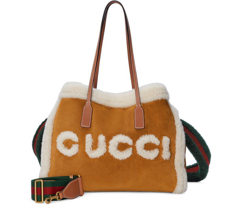 GUCCI，棕色麂皮翻羊毛飾邊手提包，15萬9,800元。圖／GUCCI提供
