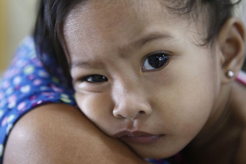 一名在海燕風災中倖存的菲律賓女孩。照片攝於2014年。路透