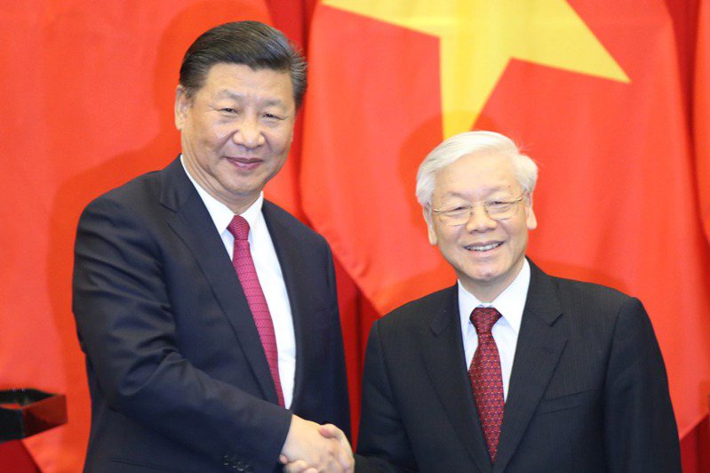 中國國家主席習近平與越共總書記阮富仲。新華社。