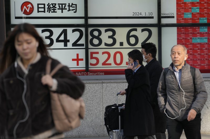 日本股市正企图重返荣耀，甚至是全世界表现最好的股市之一，总市值跃升亚洲第一。美联社(photo:UDN)