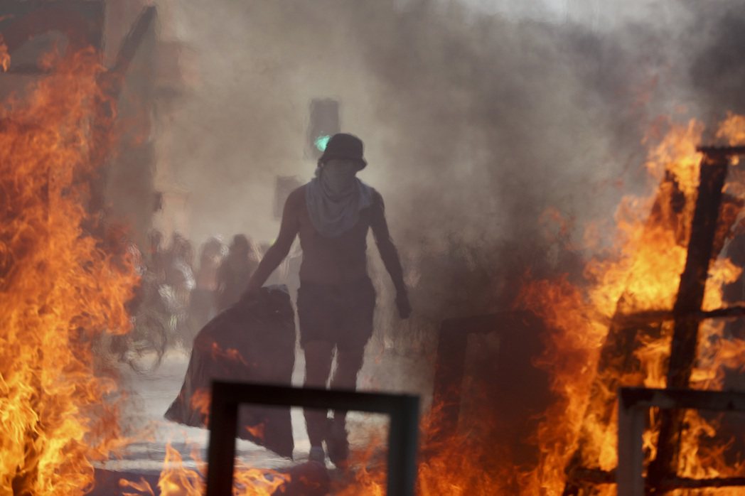 2019年，智利爆發全國性示威。 圖／美聯社