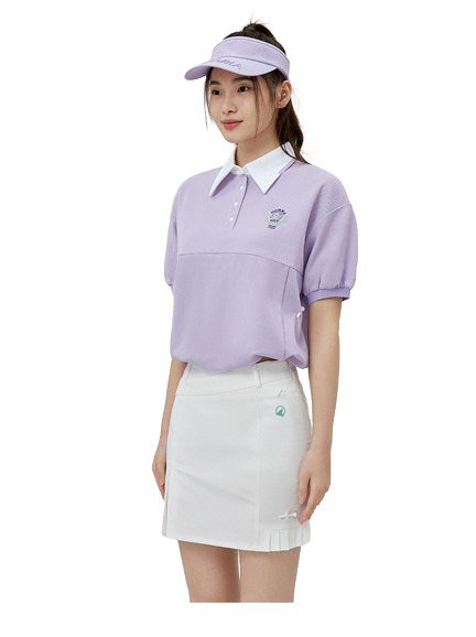 HONMA粉紫色POLO衫與小百褶短裙，成套原價11,560元，特價7,514元。圖／宏匯廣場提供