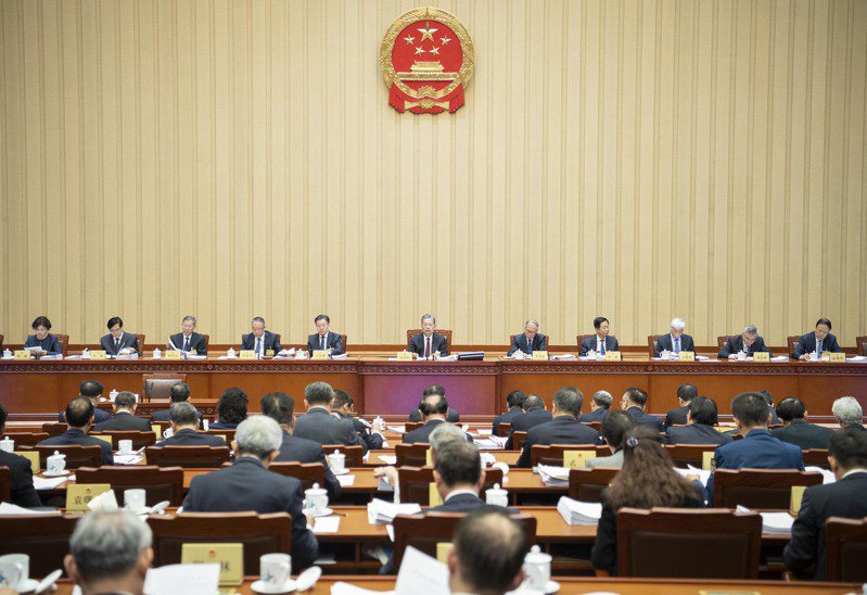 4月23日上午，十四屆全國人大常委會第九次會議在北京人民大會堂舉行第一次全體會議。圖／新華社
