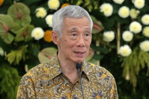新加坡總理李顯龍十五日即將卸任，圖為四月廿九日李顯龍訪問印尼時舉行記者會。（歐新社）