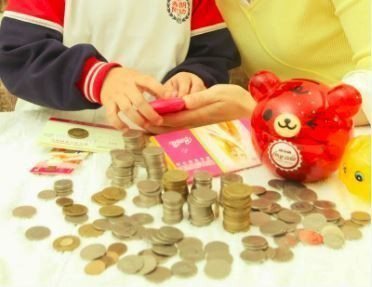 6成台灣父母認為「孩子學習如何做預算和存錢」是最重要4大目標。圖／聯合報系資料照