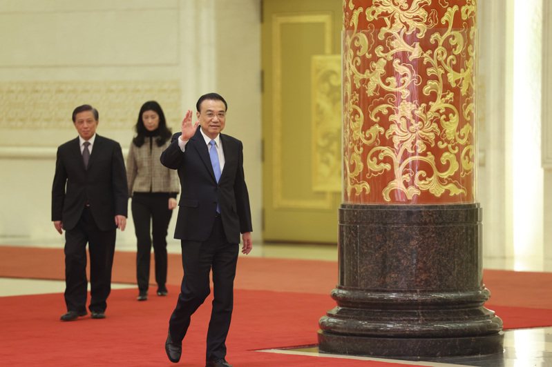 中國國務院總理李克強11日在北京人民大會堂出席記者會並回答中外記者提問。（新華社）